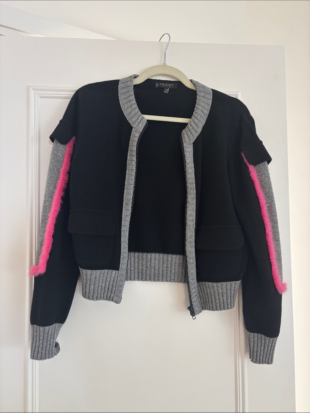Black Bomber Jacket with Gray Trim and Pink Sleeve Detail